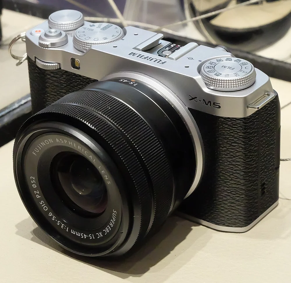 Fujifilm X-M5 camera. Body-only recommendation: any pictured interchangeable lens or accessory is not included.